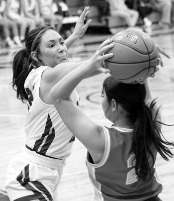 Novah Carrasco blocks a Van Horn player at the Lady Buck’s last home game. Photo by Joh Covington