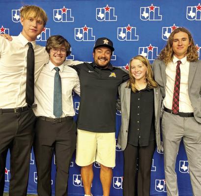 On Monday, Alpine High School CX Debate team members competed in Austin at the UIL State CX Debate tournament against 59 other 3A teams. The team of Chris Craver-Turner and Zane Wash finished 36th with a record of 2-2, while the team of Hatfield Cason and Sye Behan finished 19th with a record of 3-1.