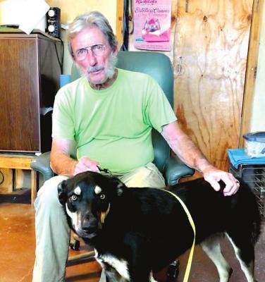 Veterinarian Samuel Bottenfield of Rio Vet Services in Terlingua tended to patient Tonka, who had a cactus thorn stuck in his paw. Bottenfield retired July 1 after over 12 years of service to the region.