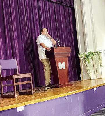 Marfa ISD interim superintendent Arturo Alferez prepares himself for the multitude of questions and concerns from the Marfa community at Monday evening’s town hall.
