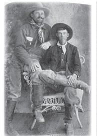 1900s Cowboys John Henderson and Roy Stillwell (seated)