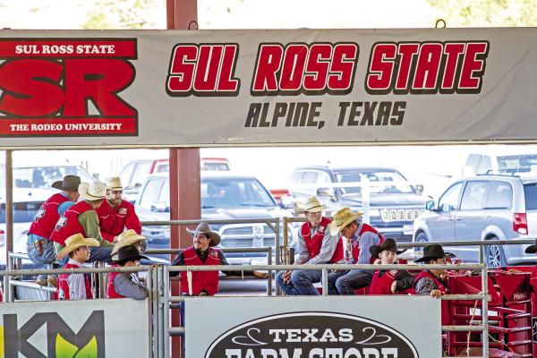 Members of the Sul Ross Rodeo men’s team talk strategy and work on their mental game prior to Thursday night’s performance at the 80th annual Sul Ross Rodeo and first-ever Lone Star Region rodeo. Photo by Kara Gerbert