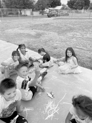 Alpine Elementary students took to the sidewalks at AES last week to express their artistic sides using chalk. Courtesy photo