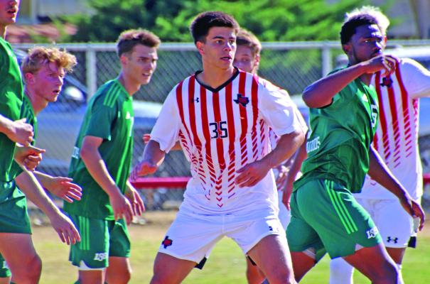 Argentina native Manuel Ruiz Luque is surrounded by Greyhounds during the Lobos match-up against Eastern New Mexico on Saturday. The Lobos were bested by the Greyhounds earlier in the season, but neither team was able to put a ball in the net during their second meeting, resulting in a draw. Photo courtesy of Sul Ross Sports