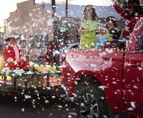 Santa struggled with the snow during this year’s Christmas parade held on Saturday night. Courtesy photo