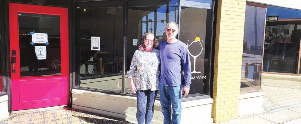 Tom and Sharon Kelner stand outside Alpine Wine. Avalanche photo by Roxanne Hill.