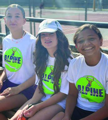 Alpine Middle School tennis players Caisyn Hinojos, Harper Holland, and Rayah Ramos get some rest after competing against Kermit in the junior high District tennis tournament held on Saturday at Sul Ross. Courtesy photo