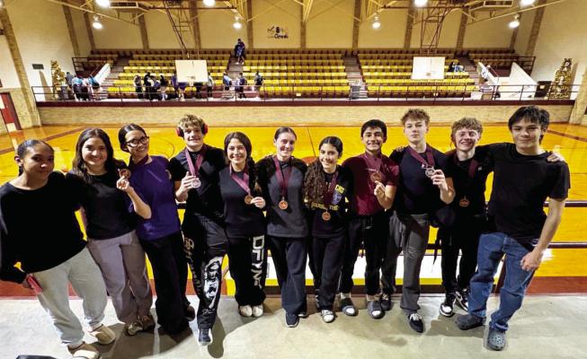 The Alpine Fightin’ Buck and Lady Buck powerlifters brought home eight medals on Saturday while competing in Kermit. Courtesy photo