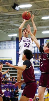 Senior Alpine Buck Kelton Tarrant took full advantage of his height during the Bucks trouncing of TexLine during the Caprock Tournament in Lubbock last week. Courtesy photo