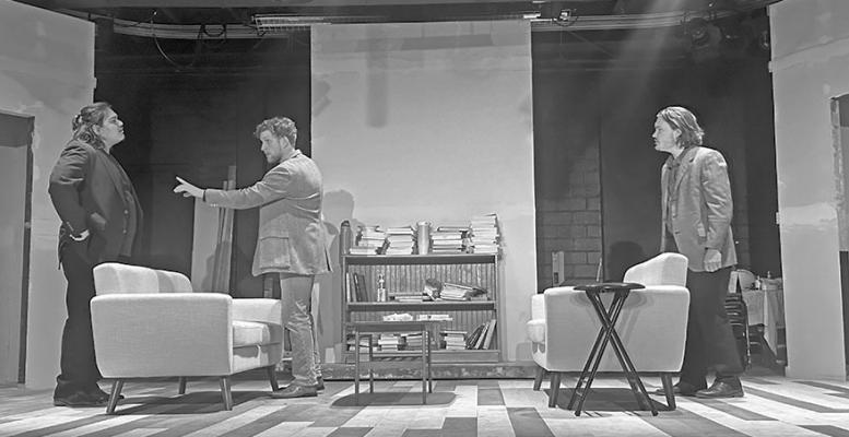 Cristian Sanchez, Justin Hinton, and Garrison Rutledge rehearse a scene from “Art” by Yasmina Reza in the Fine Arts Building Studio Theatre. Courtesy photo