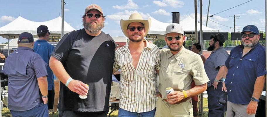 Phillip Moellering, pictured along with friends Shane Smith of Shane Smith and the Saints and Ricky Castillo of Mill Scale Metalworks, is the pitmaster at Brick Vault Brewery and Barbecue in Marathon. He competed at Black Rifle Coffee Company’s Lockhart Rising competition recently. Billy Ray Hinojos of Alpine is on the far right. Courtesy photo