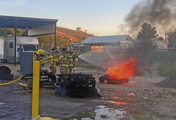 Last Wednesday evening the Alpine Volunteer Fire Department held a live fire demonstration of a chemical encapsulating compound (F-500) designed to extinguish fires such as those of the lithium-ion batteries found in electric vehicles. This demonstration was open to the public and around 50 people were in attendance for the event. Photo courtesy of Alpine Volunteer Fire Department