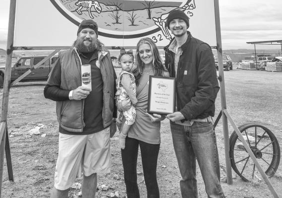 Wright Hardware Store owners Scott, Adalyn, Alye, and Austyn are pictured with their Business of the Year award for 2023.