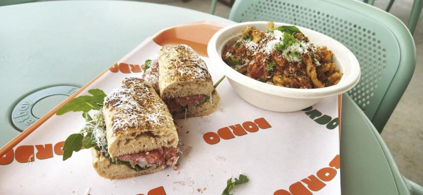 Bordo’s beautiful and fresh Emiliani sandwich with prosciutto and the pasta Arrabiata that has a lovely chili and garlic bite. Photo by Joh Covington