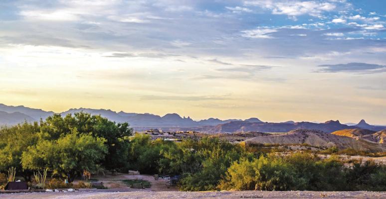 Looking towards Big Bend National Park from the Porch in the Terlingua Ghostown, the abundance of the recent additions of short term rental properties are not visible, but if you take a drive down Hwy 170 from Study Butte to Lajitas, the growth is all too noticeable. Photo by Kara Gerbert