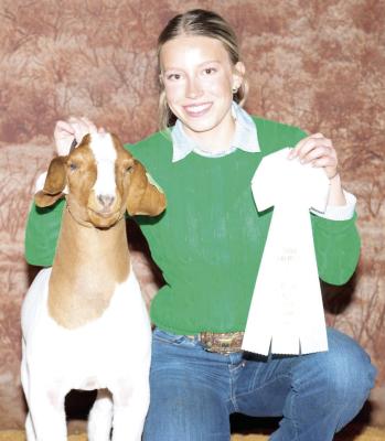 Kylie Maroney is pictured here with her goat, which earned third place in class one at this year’s San Angelo Stock Show. Courtesy photo