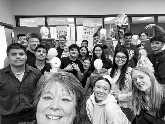 Seniors in the Senior CPR class, taught by Ms. Gayla Owen, AISD district nurse, practiced each Wednesday during the month of April the fundamentals of CPR. Students will receive a certification after the class is completed. Courtesy photo