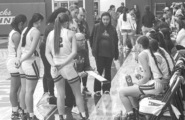 Coach Christopher Virdell guides the Lady Bucks during a recent game.