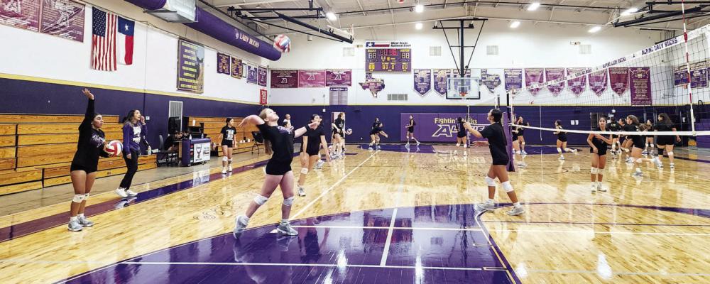 Carolyn Newman practices her serving skills during last week’s Alpine Lady Bucks volleyball practice. Photo by Kara Gerbert