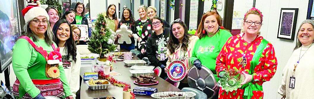 Each year, the 588 Special Education Co-op hosts a cookie exchange. The staff is pictured here just before the Christmas break, enjoying the fruits of their labors. Courtesy photo