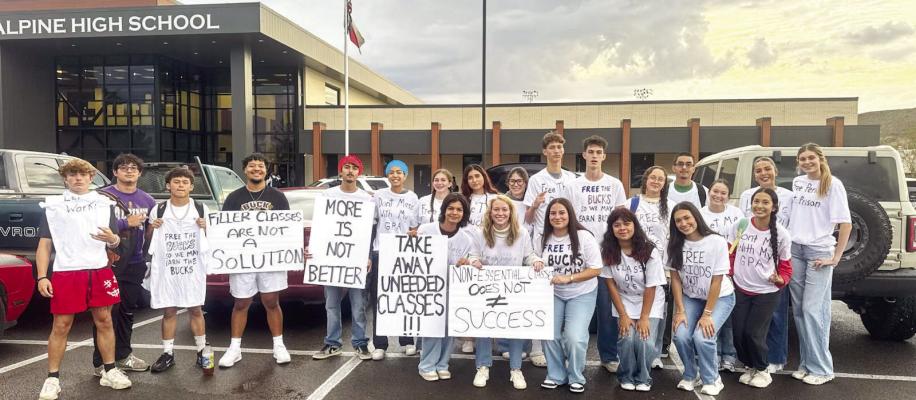 Students from the Senior Class at Alpine High School protest Superintendent Dr. Michelle Rinehart’s new policy decision on Tuesday. Organizer Jack Juett told the Avalanche, “Students who have spent years working hard to earn free periods their senior year found out the rules had suddenly changed.” Many students have historically doubled up on classes as underclassmen to have a lighter load their senior year. Photo by J.T. Maroney