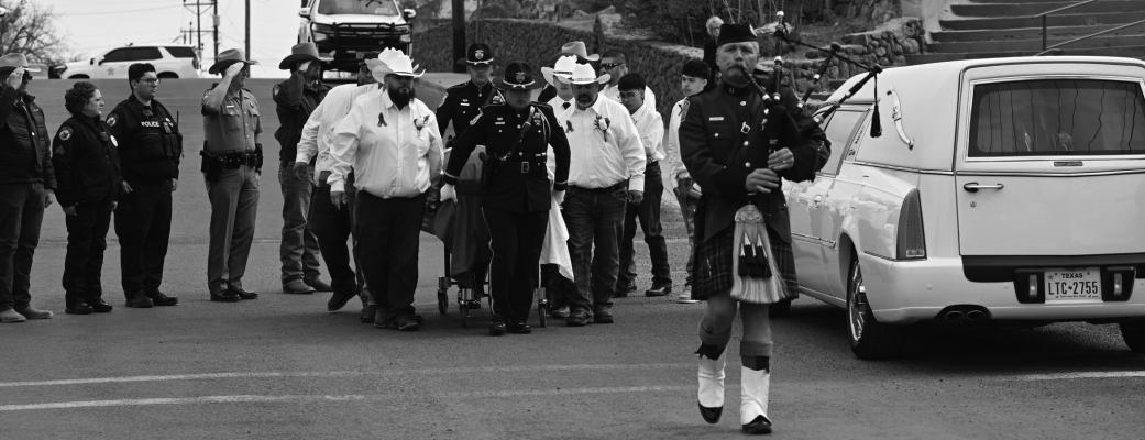 Tom Hyatt, a piper for the U.S. Border Patrol, leads the procession for former Alpine Police Department Chief Ruben Melgoza, whose watch ended on February 14. Services were held last Thursday at Our Lady of Peace Catholic Church with officers from the Texas Department of Public Safety, Brewster County Sheriff’s Office, U.S. Border Patrol, and Alpine Police Department in attendance with friends and family. Photo courtesy of Alpine Police Department