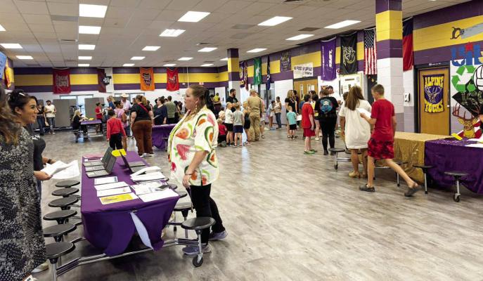 Amanda Lujan, Director of Food and Nutrition at Alpine ISD, was at the Alpine Middle School’s open house to talk to parents about the fresh food initiatives she’s bringing to school lunches. Courtesy photo
