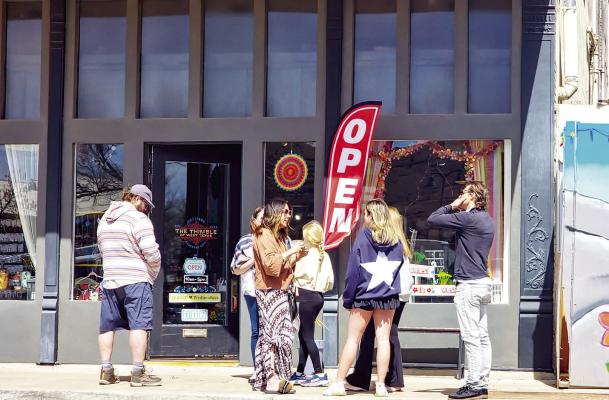 Visitors check out local businesses