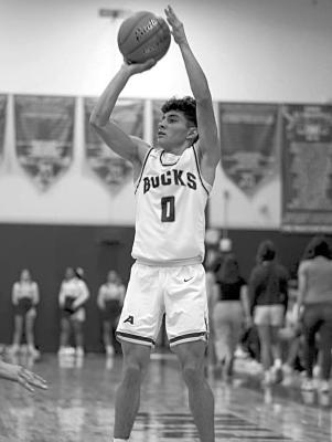 Evren Martinez shoots the ball at a recent home game. Photo by Annika Canaba.