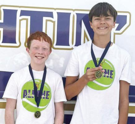 Ty Ritchie and Brody Warren are all smiles as they took home gold medals from this past weekend’s middle school Fabens Invitational tennis tournament. Courtesy photo