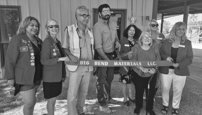 The Alpine Ambassadors held a ribbon cutting last Wednesday for Big Bend Materials, LLC. The business, formerly owned and operated by Herman Acosta Sr. on the left is being taken over by his son, Herman Acosta Jr. (middle). Herman Sr. will continue to be a part of the business going forward. Photo by Kara Gerbert