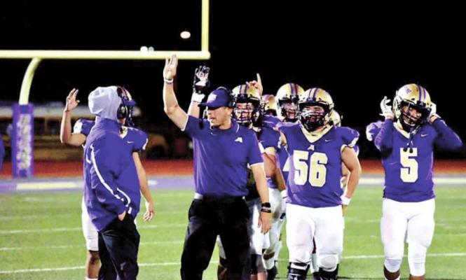 The Alpine Fightin’ Bucks prepare to play Anthony where they won 48-13. Photo by Felipe Fierro