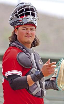 Peyten Kennard looks toward his Cowboy teammates from home plate at Kokernot Field. Courtesy photo