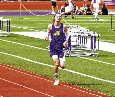 AHS Senior track star Hatfield Cason won the boys’ 1600m race this past Saturday, blowing past his competitors from the start and keeping the lead throughout the competition. Photo by Kara Gerbert