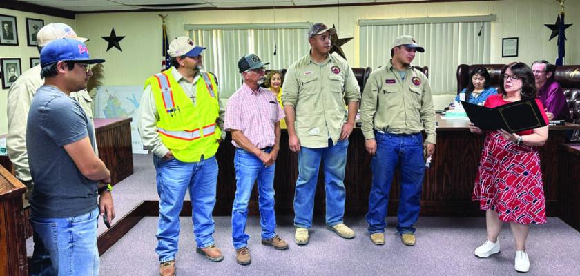 Members of the City of AlpineÊs gas department were on hand to receive the proclamation from Mayor Catherine Eaves, proclaiming the week of October 6-12 as National Public Natural Gas Appreciation Week. Photo by J.T. Maroney