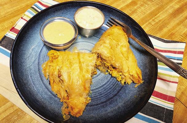 Chicken Shawarma in phyllo with jalapeno hummus and tzatziki sauce. Photo by Kara Gerbert