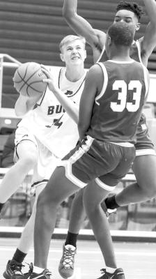 Zane Wash drives the baseline Friday against Lubbock Estacado in Fort Stockton. Photo by Shawn Yorks