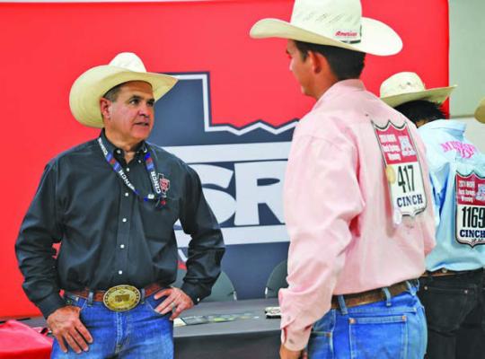 Sul Ross rodeo coach C. J. Aragon talks up Sul Ross and their rodeo program and agriculture curriculum recently at this year’s National High School Finals Rodeo College Fair. Aragon’s recruitment skills and his dedication to his team’s academics are a big part of his program’s success. The team has recently partnered with Smarty Rodeo, a collegiate rodeo training program that will bring some new training equipment for this year’s rodeo students. Courtesy photo