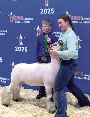 Rynn Matthews placed sixth at the Houston Livestock Show with her heavy-weight fine wool cross lamb last Wednesday. Courtesy photo