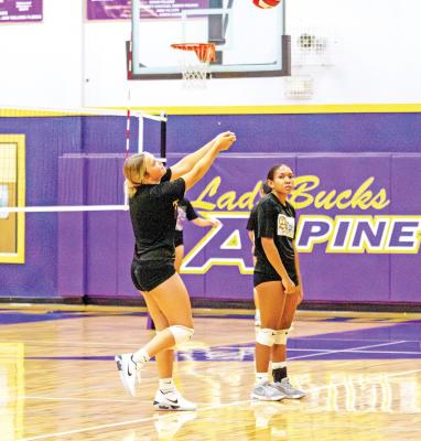 Lady Buck Kacy Hawkins works on her bump return form, as fellow teammate Haily Adams looks on. Photo by Kara Gerbert