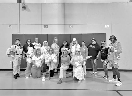 Barbie seems to be a common theme for Halloween this year as teachers and staff from Alpine Elementary dressed up as everything from astronaut Barbie to president. Photo by Kara Gerbert