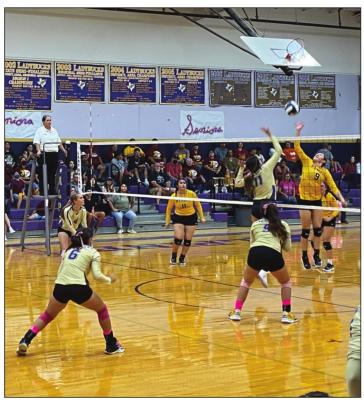 The Lady Bucks face off against the Kermit last week in a hard-fought battle. Avalanche photo by J.T. Maroney