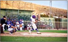 AJ Llanez takes a swing at a ball last Tuesday in the Bucks first district match-up against Crane. Photo by Felipe Fierro