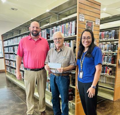 Alpine ISD’s Jarret Vickers presents a check to Alpine Public Library Director Don Wetteraurer, along with Alpine ISD’s Interim CFO Micella Salcido, for $10,000 from the Educational Partnership of the Permian Basin (EPPB) Trust for Civic Life Re-Grant. Courtesy photo
