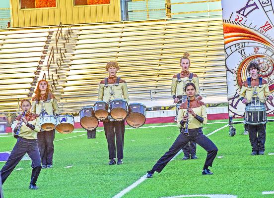 The Alpine Fightin’ Buck Band performed their 2023 UIL marching performance “Time After Time” Friday night at Buck Stadium before they departed for Odessa on Saturday to perform at Ratliff Stadium. Pictured are Jaylynn Celaya on clarinet, Sierra Ruckman on toms, Walt Urbanczyk on toms, Megan Struthers on clarinet, Hatfield Cason on snare drum, and Owen Thompson on snare drum. Photo by Kara Gerbert
