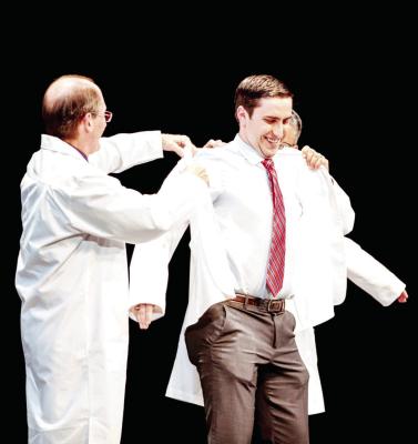 Blake Billings receives his White Coat during ceremonies welcoming him to Texas Tech University’s Health Science Center medical school. Photo courtesy of TTUHSC