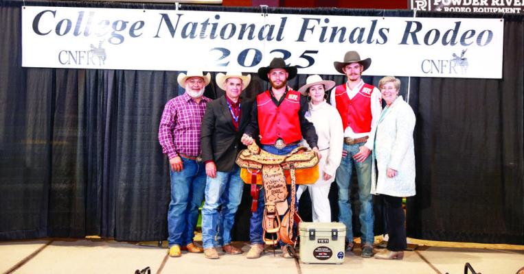 Sul Ross Rodeo’s Cameron Haumea (center) from Honolulu earned the College National Finals Rodeo Championship Steer Wrestling title last week in Casper, Wyoming. Haumea is pictured with his dad Cy Haumea, Coach C.J. Aragon, his mom Jessica Haumea, Zane Cline, and Dean, Dr. Bonnie Warnock. Photo by Jackie Jensen