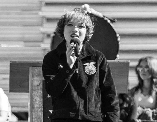 Collette Sharron sings God Bless America to local veteran’s at the Alpine ISD Veteran’s Day ceremony. Avalanche photo by Kara Gerbert