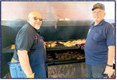 American Legion Post 79 members Andy Ramos and the late Vince LaValle cook up chicken and sausage for the Legion’s annual Independence Day barbecue in Alpine in 2019. The Legion has held its July 4th cookout for more than 100 consecutive years.