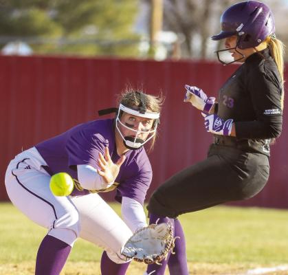 Kody Hawkins stands ready to beat the runner in Friday’s pre-season scrimmage against Pecos at the Sul Ross softball field. The Lady Bucks head to Coahoma for a tournament on Thursday to open season play. Photo by Shawn Yorks